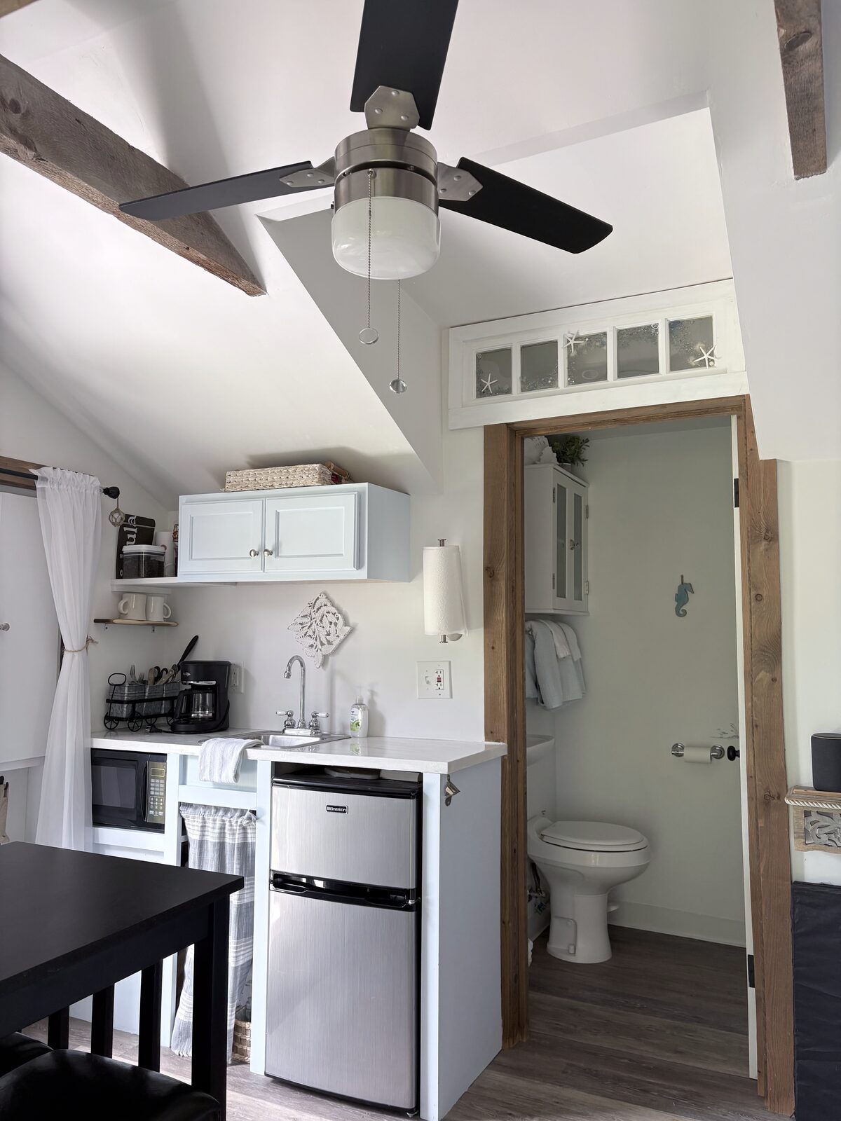 Kitchenette and bathroom entry